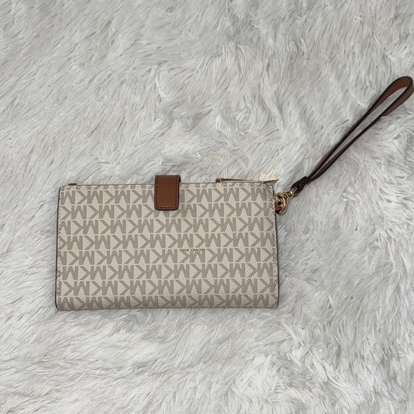 Michael Kors Handbags - Michael Kors Beige Monogram Wristlet